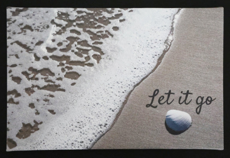 Canvas print with scenic a shell and waves on a beach with 'Let it go' text.