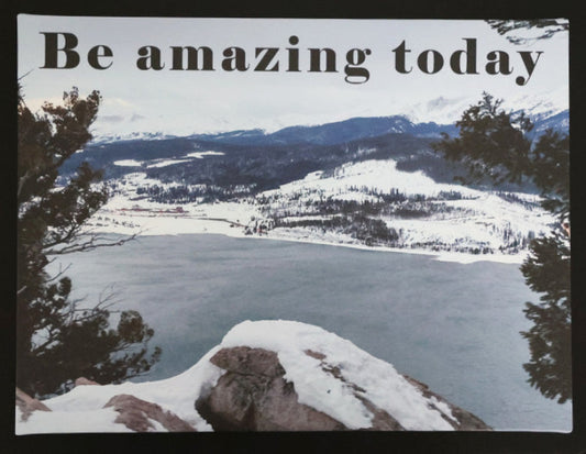 Canvas print with scenic winter view of a lake and mountains with 'Be amazing today' text.