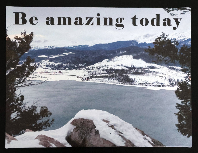 Canvas print with scenic winter view of a lake and mountains with 'Be amazing today' text.