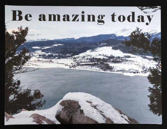 Canvas print with scenic winter view of a lake and mountains with 'Be amazing today' text.