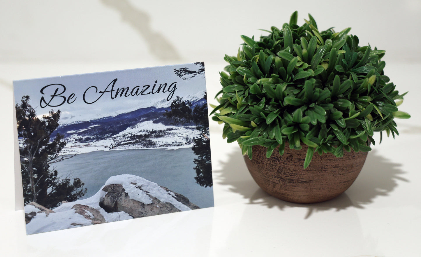 Note card with scenic mountain and "Be Amazing" quote.