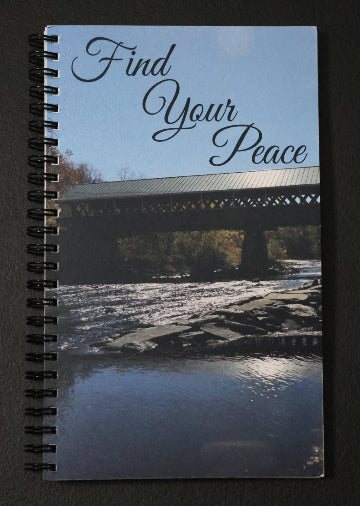 Journal with a covered bridge on the cover and 'Find Your Peace' text.