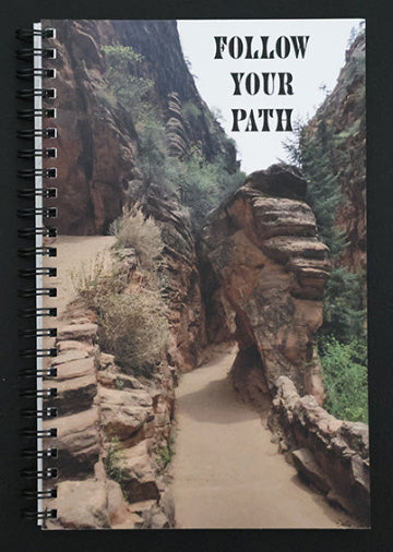 Journal with a scenic rock formation and 'Follow Your Path' text.