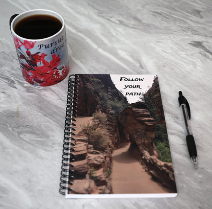 Journal with a scenic rock formation on the cover and 'Follow Your Path' text.