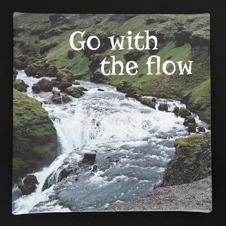 Canvas print with scenic landscape with a river with 'Go with the Flow' text.