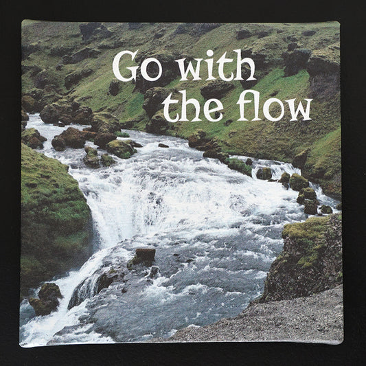 Canvas print with scenic landscape with a river with 'Go with the Flow' text.