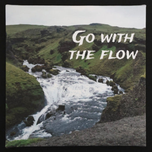 Canvas print with scenic landscape with a river with 'Go with the Flow' text.