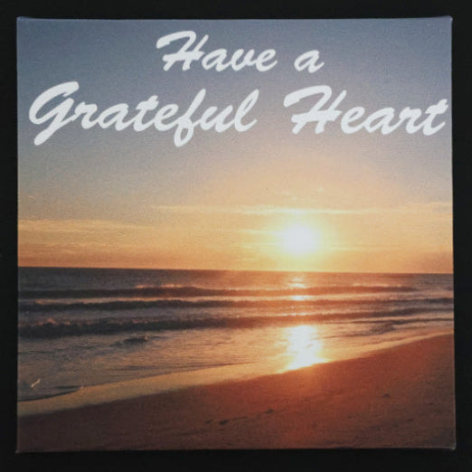 Canvas print with scenic sunset over the ocean with 'Have a Grateful Heart' text.