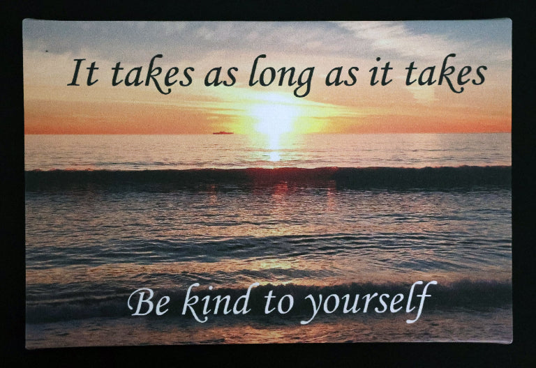 Canvas print with scenic sunset over the ocean with 'It takes as long as it takes' text.