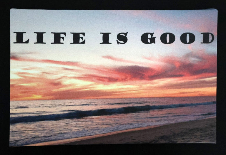 Canvas print with scenic sunset over the ocean with 'Life is good' text.