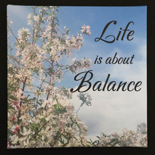 Canvas print with cherry blossoms against a blue sky with 'Life is about Balance' text.