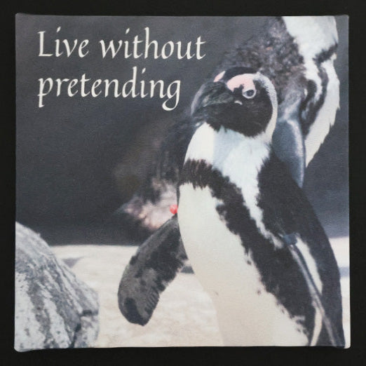 Canvas print with a penguin with 'Live without pretending' text.