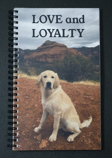 Journal with a dog and mountain landscape on the cover, featuring the text 'LOVE and LOYALTY'.