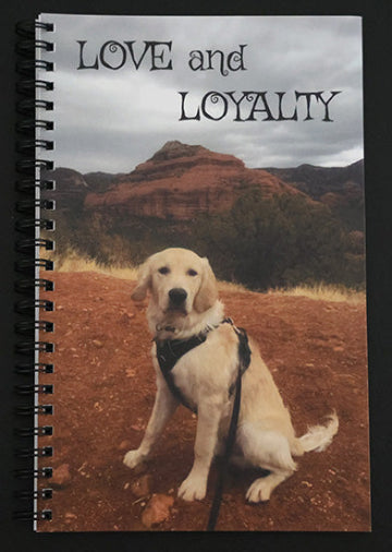 Journal with a dog and mountain landscape on the cover, featuring the text 'LOVE and LOYALTY'.