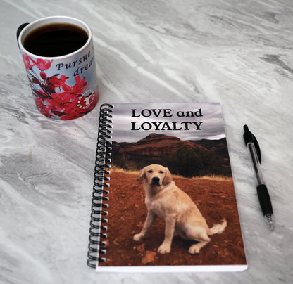 Journal with a dog and mountain landscape on the cover, featuring the text 'LOVE and LOYALTY'.