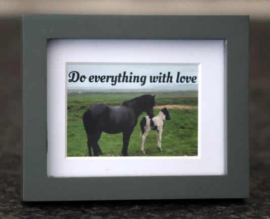 Framed picture with 'Do everything with love' quote.