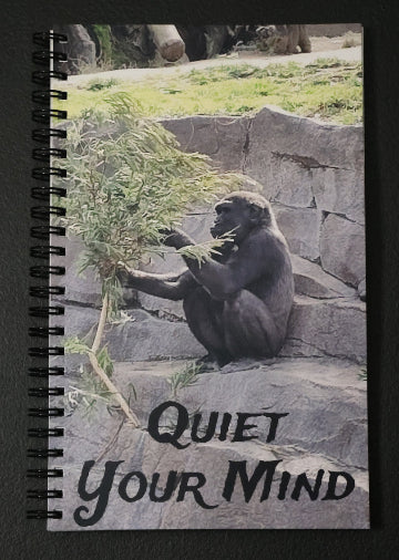 Journal with a gorilla on a stone on the cover and the text 'Quiet your mind'.