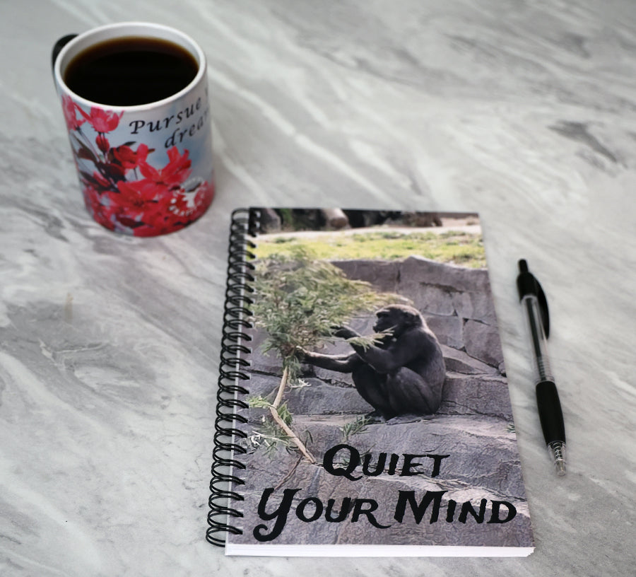 Journal with a gorilla on a stone on the cover and the text 'Quiet your mind'.