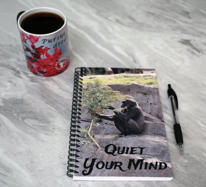 Journal with a gorilla on a stone on the cover and the text 'Quiet your mind'.