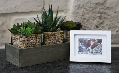 Framed picture with 'Self-care isn't selfish' quote.