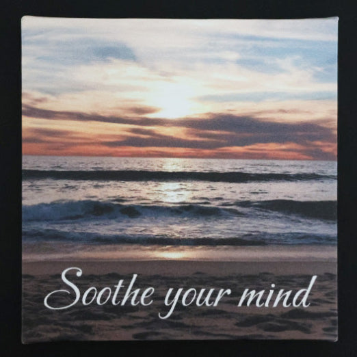 Canvas print with scenic beach sunset with 'Soothe your mind' text.