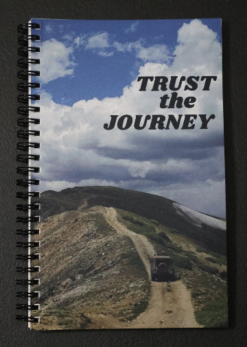 Journal with a jeep and mountain landscape on the cover, featuring the text 'LOVE and LOYALTY'.
