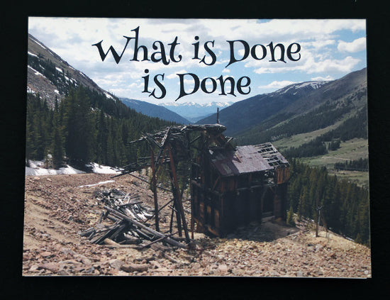 Note card with abandoned mine shack in a mountainous landscape with 'What's done is done' quote.